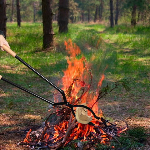 USENIOR heavy-duty tongs serve as a reliable campfire and fireplace tool