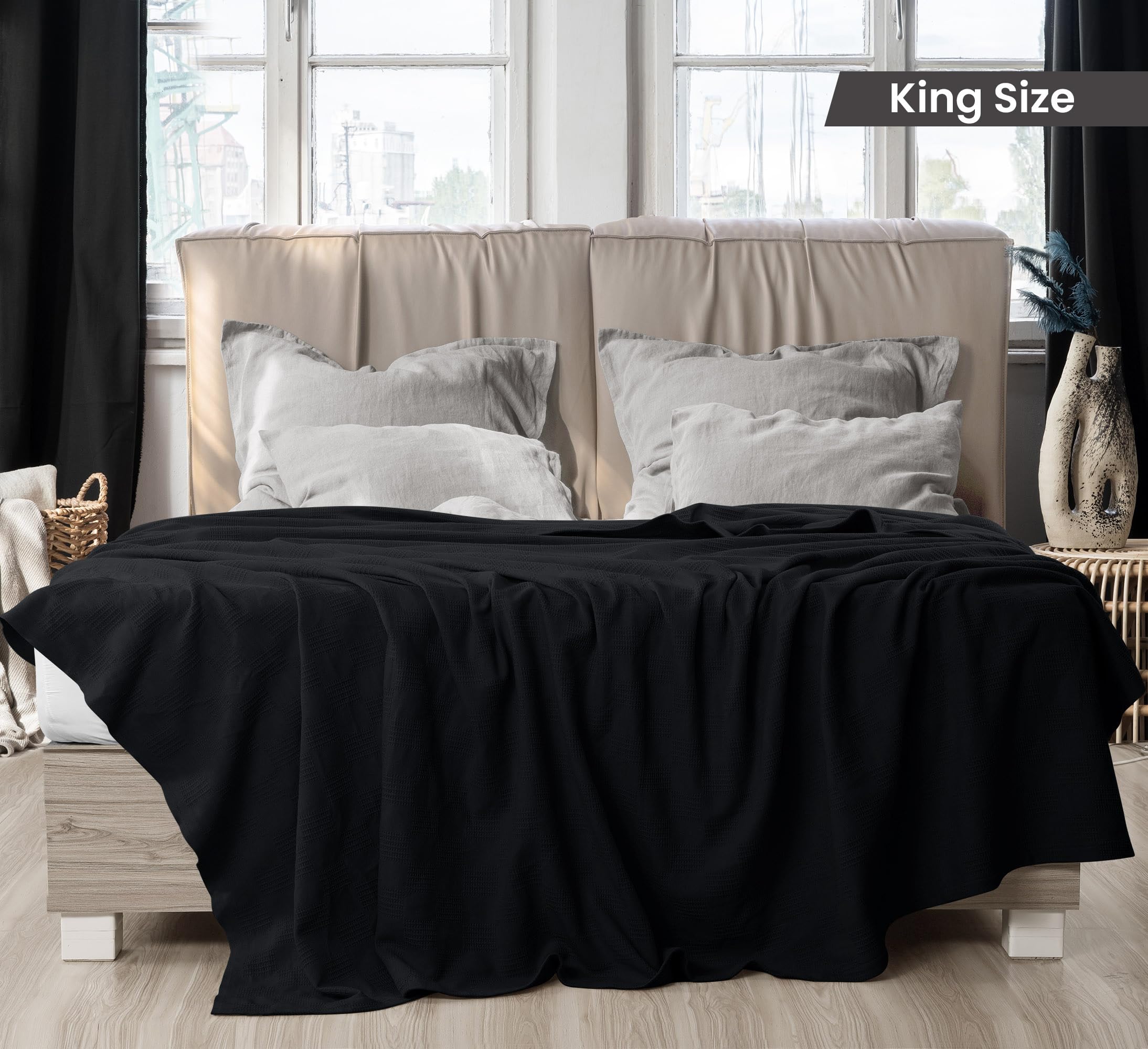 Utopia Bedding black thermal blanket draped on bed breathable all-season layering