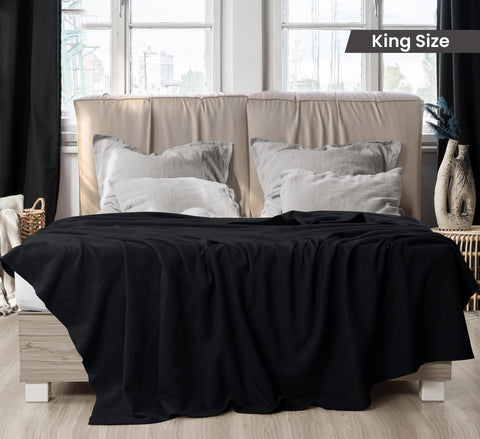 Utopia Bedding black thermal blanket draped on bed breathable all-season layering
