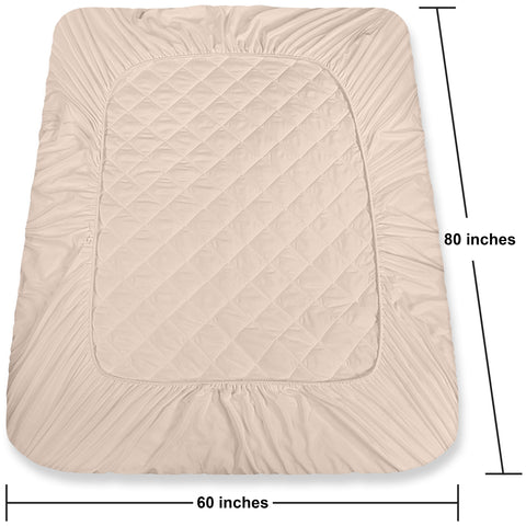 Queen 60x80-inch mattress pad from Utopia Bedding laid on a bed.