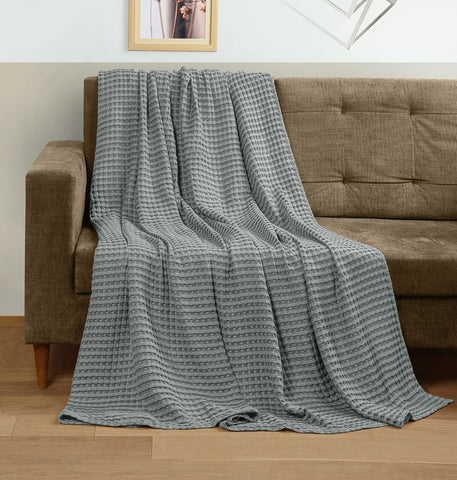 Utopia Bedding all-season blanket used on sofa for year-round comfort.