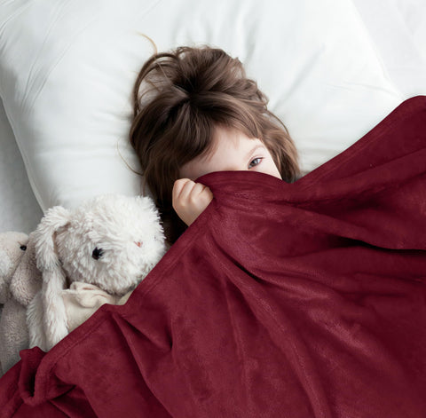 Anti-static fleece blanket burgundy to reduce static cling.