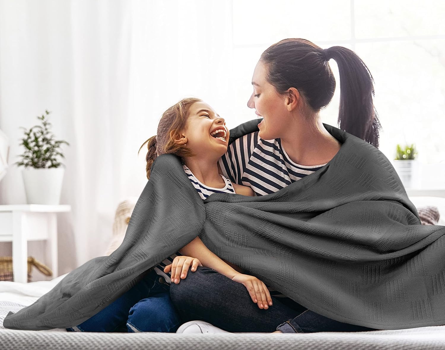 Utopia Bedding blanket close-up shows dobby weave texture and durability.
