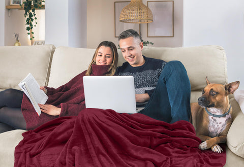 Blanket on sofa during movie night for comfortable warmth.