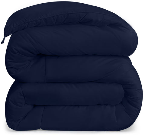 Utopia Bedding king-size comforter in navy, ideal for layered bedding setups.