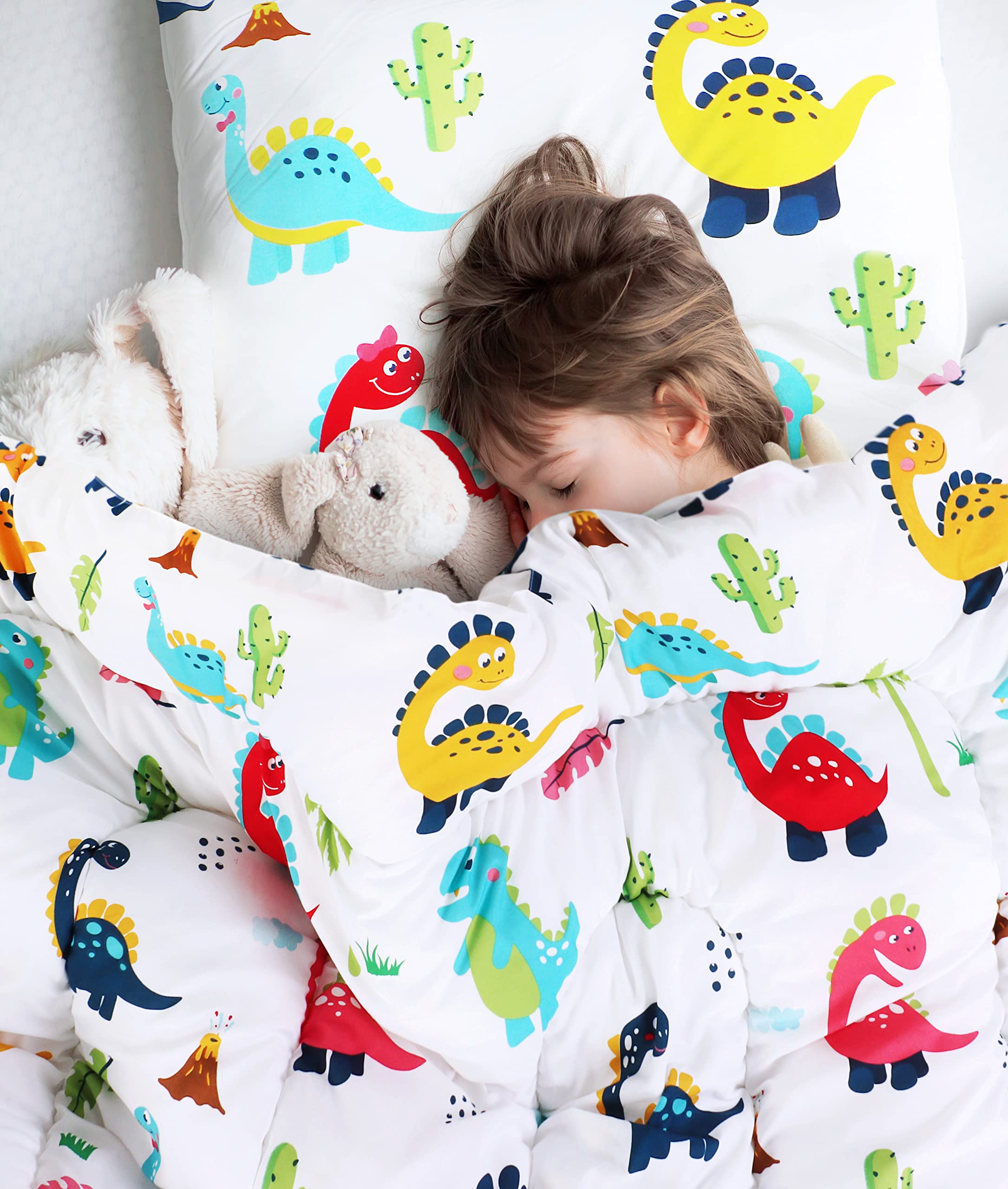 Utopia Bedding dinosaur breathable fabric tag emphasizes lightweight warmth and comfort.