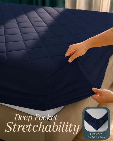 Utopia Bedding elastic edge secure fit mattress pad on a mattress