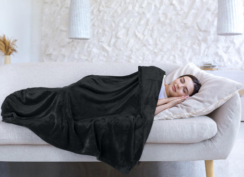 Utopia Bedding fleece blanket in an air-conditioned room for cool comfort