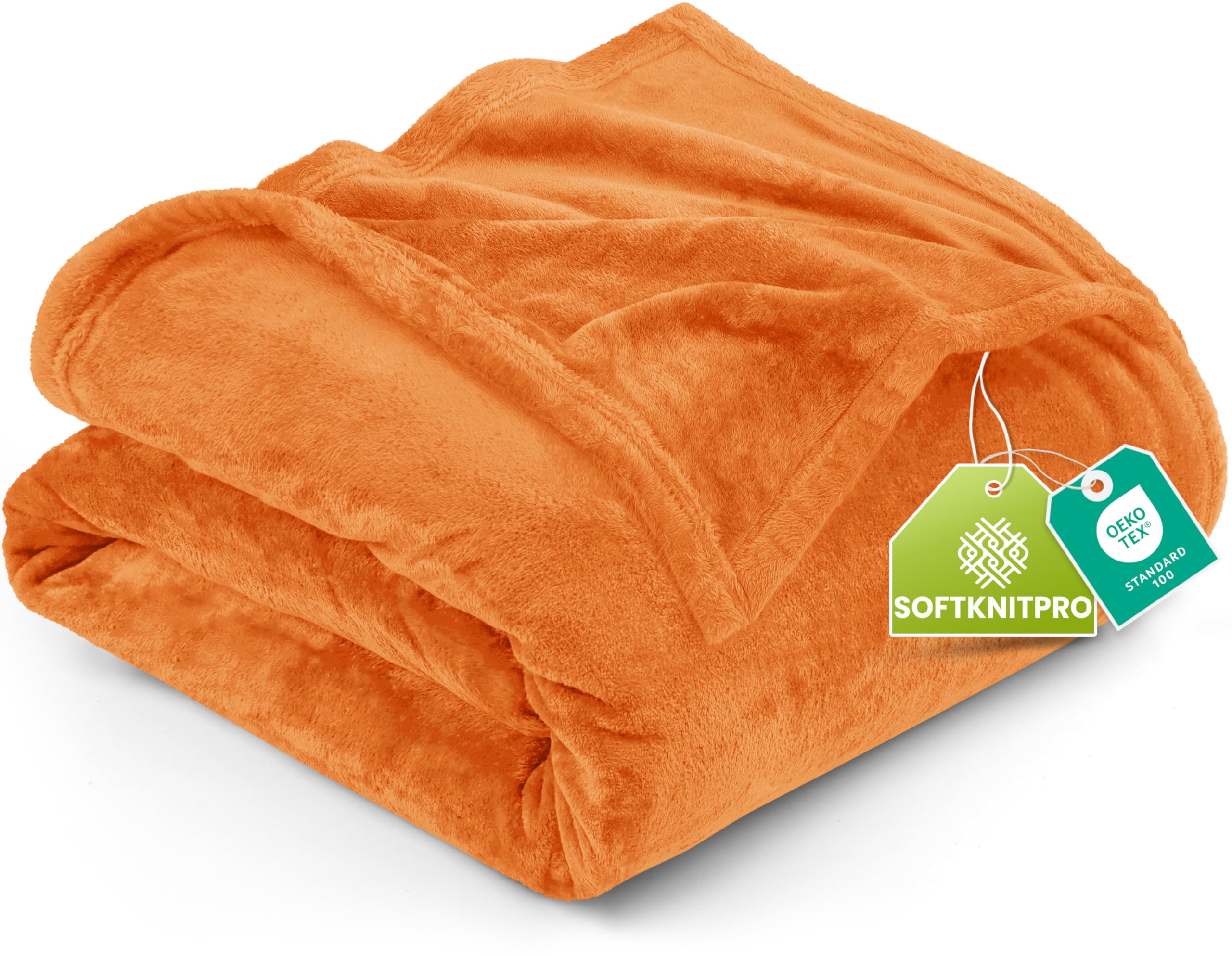 Utopia Bedding fleece blanket on queen bed shows warm, lightweight comfort in burnt orange.