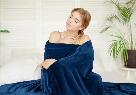 Utopia Bedding fleece blanket on couch for a cozy movie night