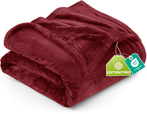 Utopia Bedding fleece blanket king burgundy 300GSM on bed for cozy warmth.