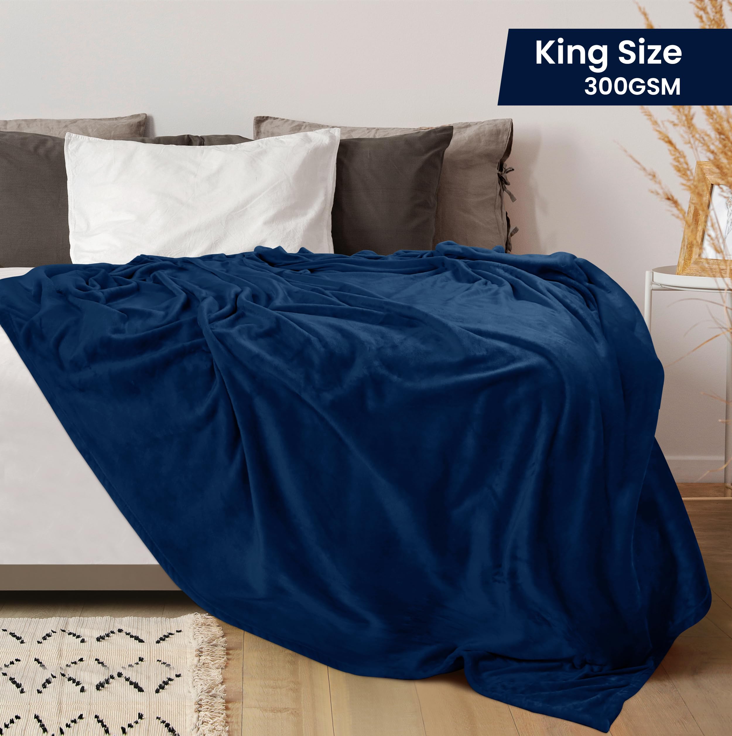 Utopia Bedding fleece blanket king navy spread, ideal for couch lounging