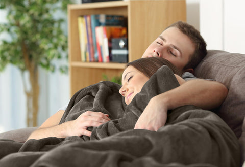 Utopia Bedding blanket in camping bag, all-season travel warmth.
