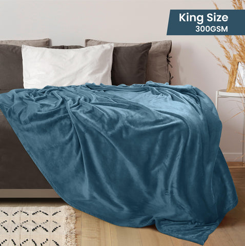Utopia Bedding fleece blanket stone blue, folded, adds luxury to bedside decor