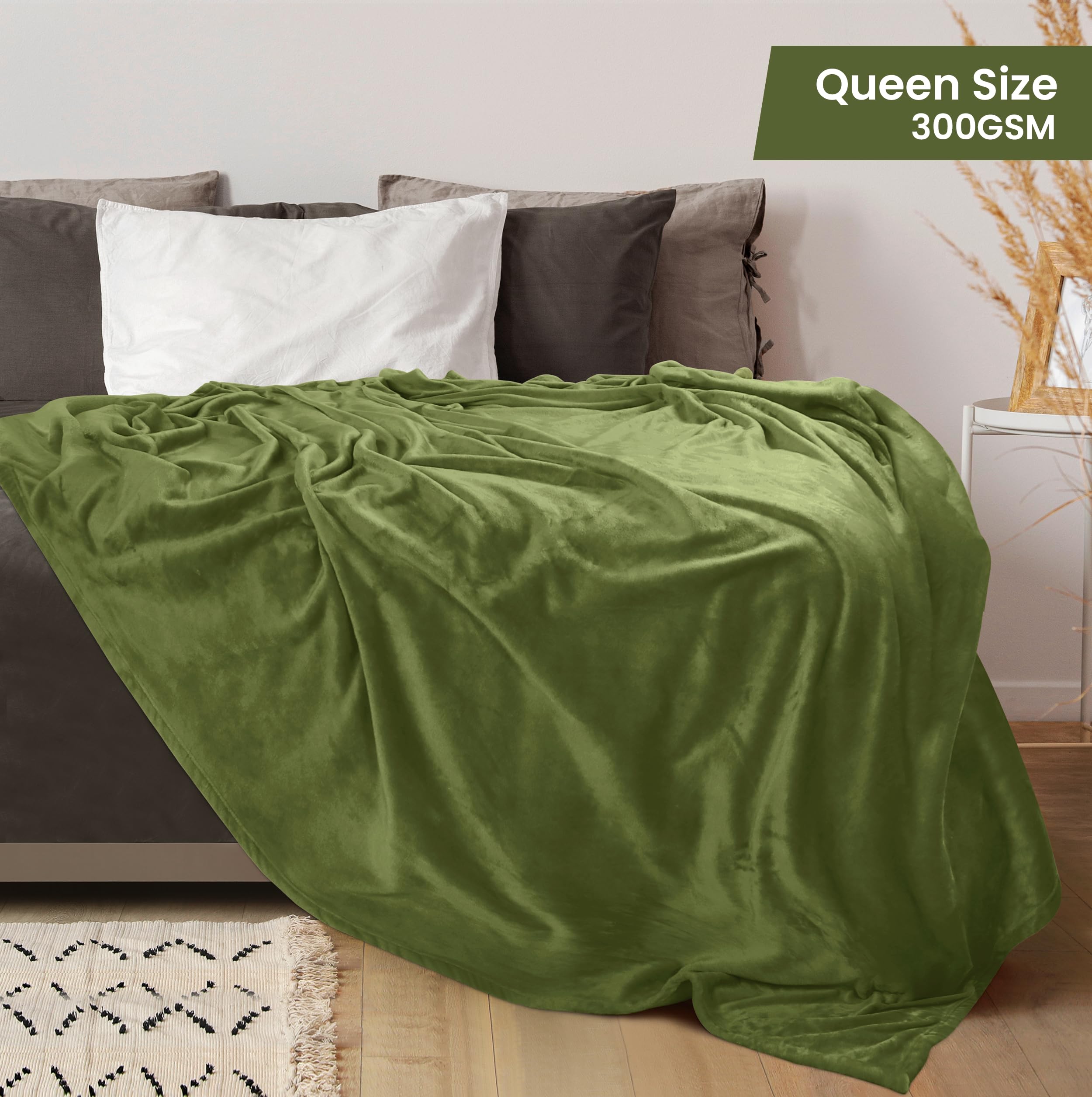 Utopia Bedding olive fleece blanket folded on bed ready for easy layering
