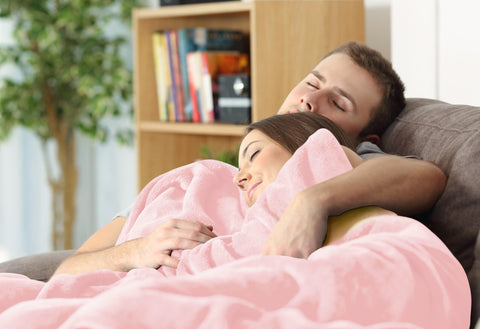 Stitching detail on pink Utopia Bedding fleece blanket demonstrates durability.