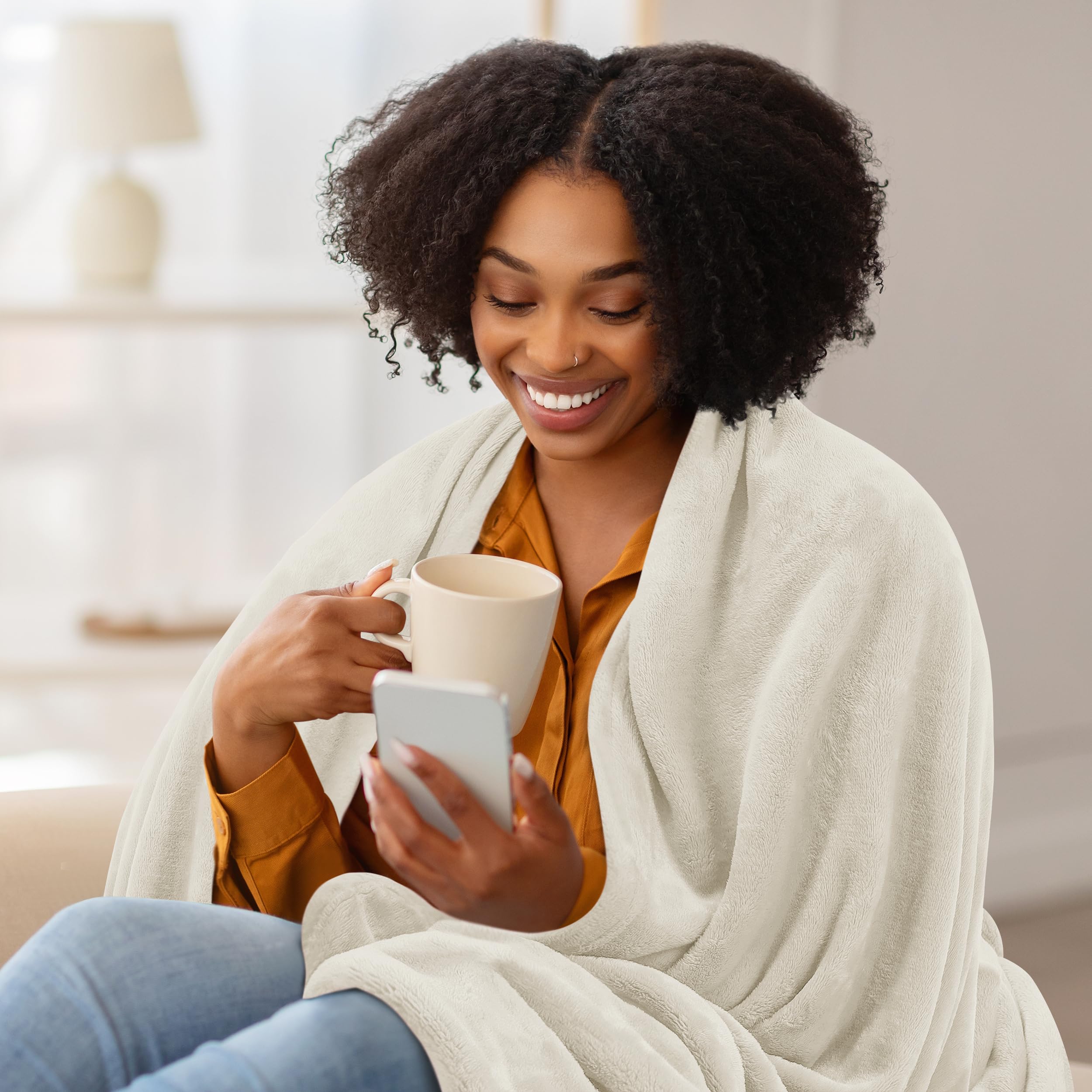 Utopia Bedding fleece blanket queen stitching detail highlights durable double-needle hems.
