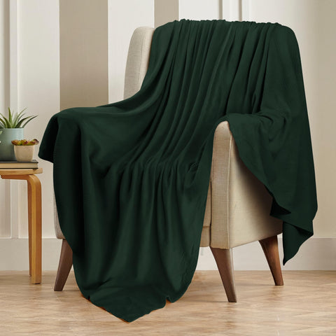 Utopia Bedding forest green blanket being washed for easy care