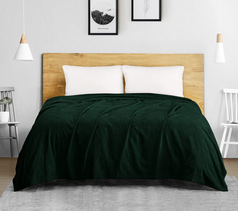 Utopia Bedding forest green blanket on bed highlighting soft texture