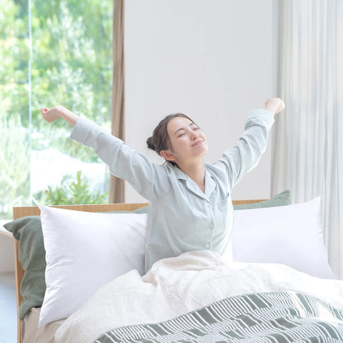 Utopia Bedding full body pillow in bed setup for cozy lounging.