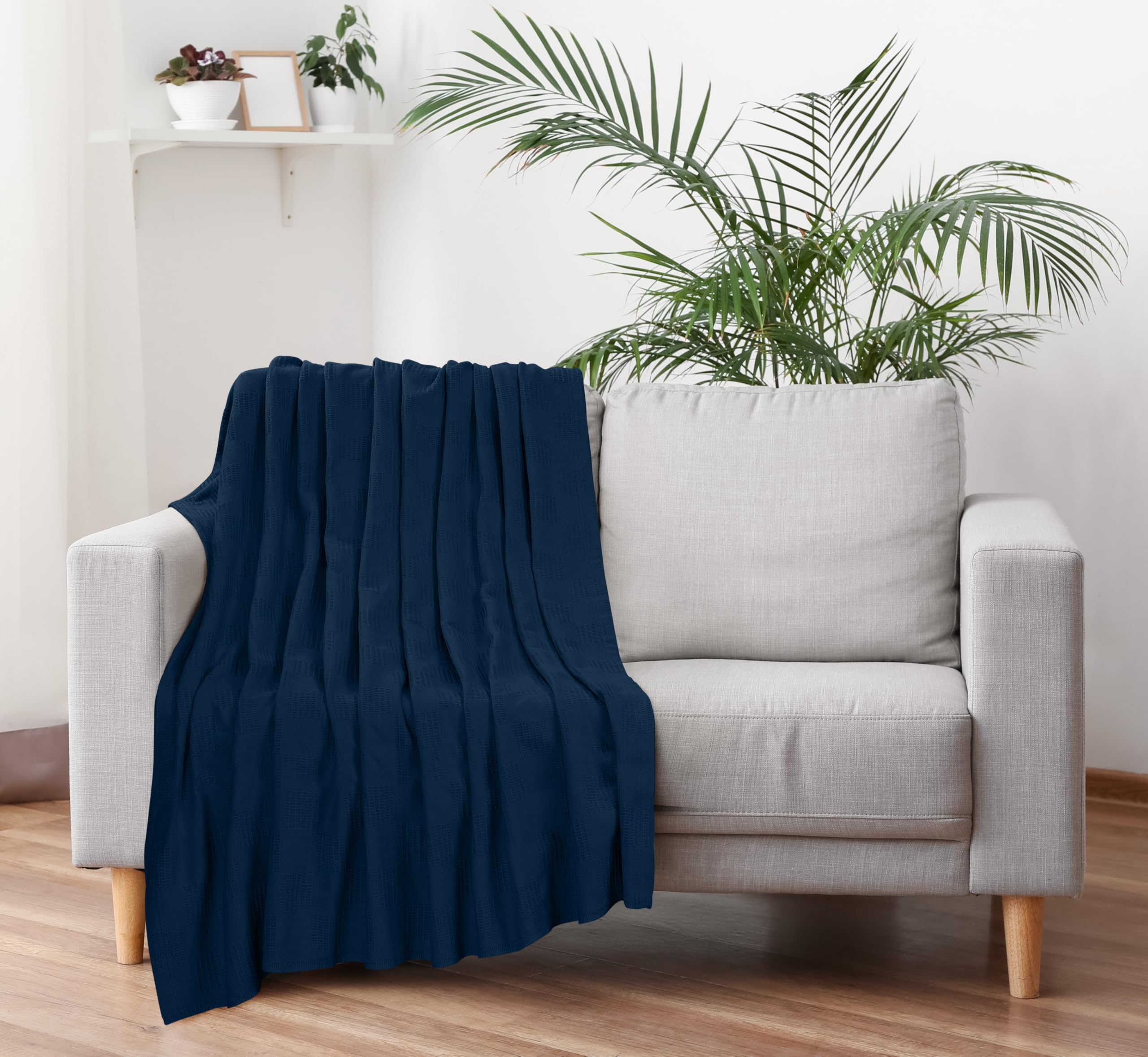 Lightweight navy cotton blanket by Utopia Bedding suitable for spring nights.