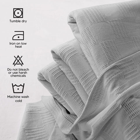 Utopia Bedding lightweight oversized blanket 90x72 inches drapes over furniture.
