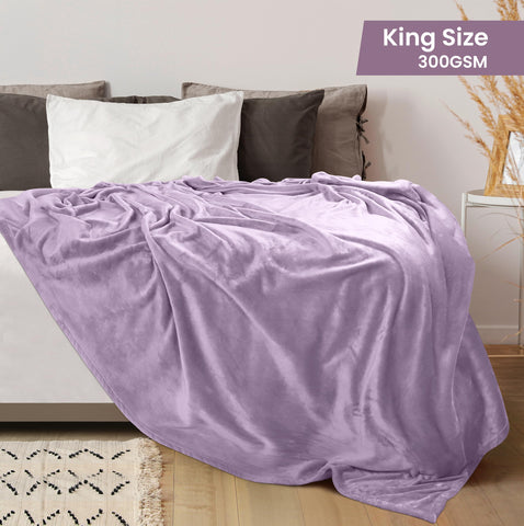 Utopia Bedding Lilac fleece blanket on bed adds soft warmth and stylish decor.