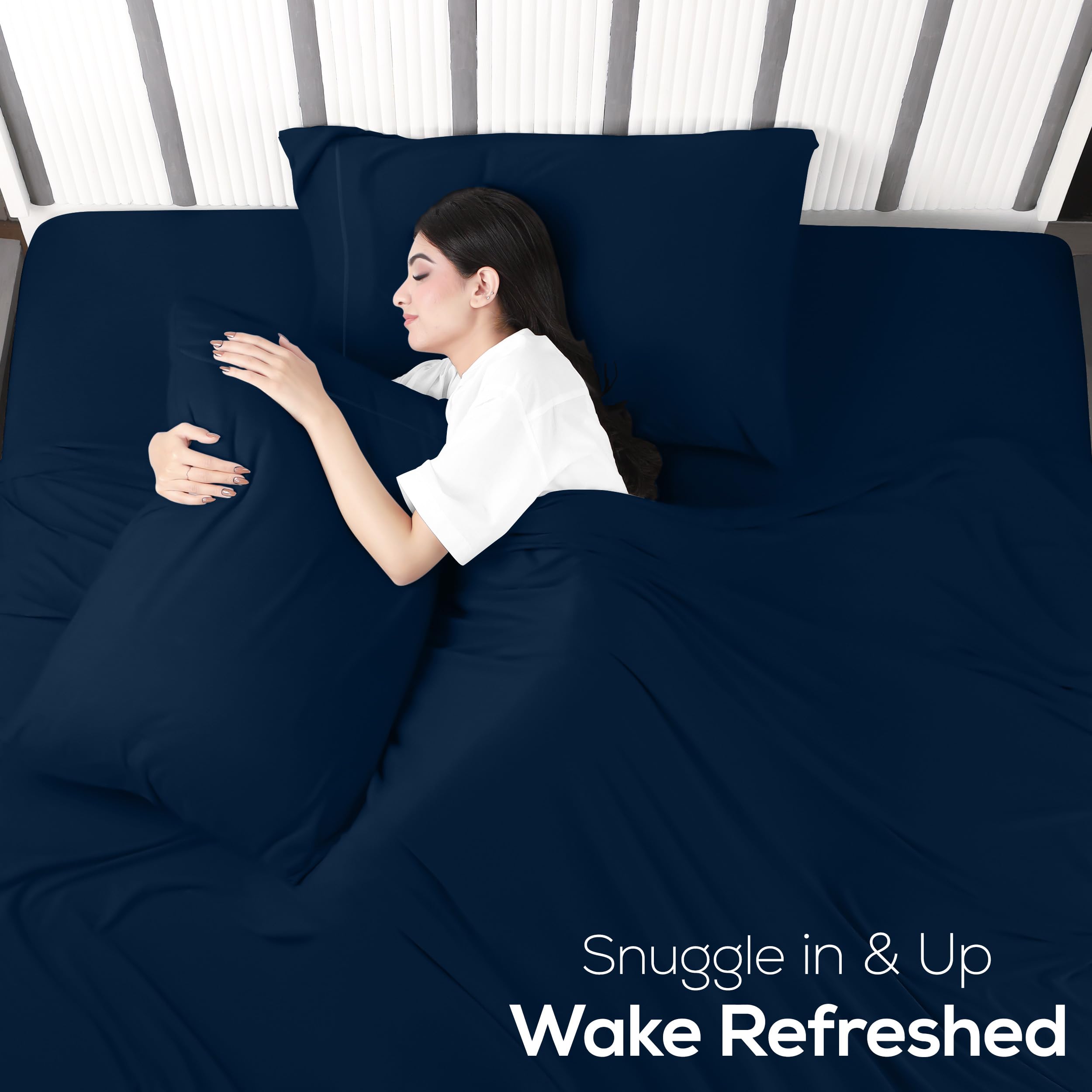 Utopia Bedding navy jersey sheets add stylish, versatile color to the bed.