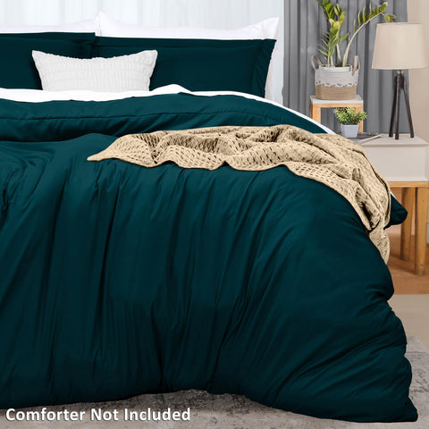 Utopia Bedding teal pillow shams with flange add a decorative touch.