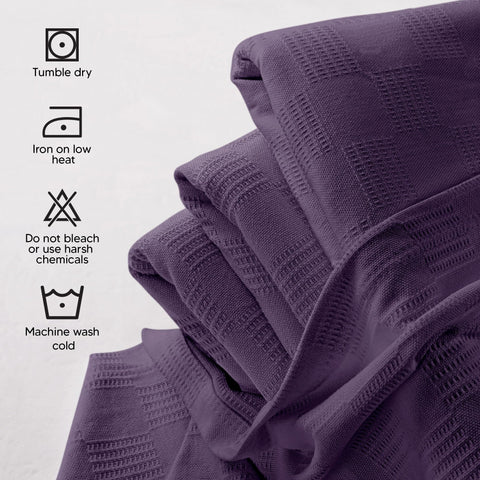 Utopia Bedding plum blanket folded at foot of bed for lightweight warmth