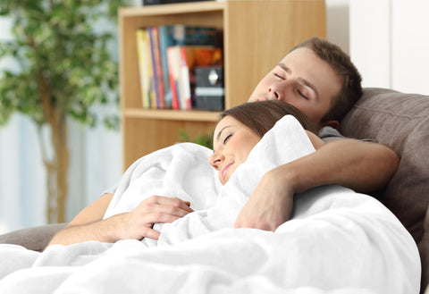 Utopia Bedding plush blanket on living room couch during movie night
