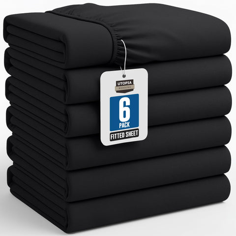 Utopia Bedding queen fitted sheet 6-pack stretched over a mattress for a snug fit and smooth finish.