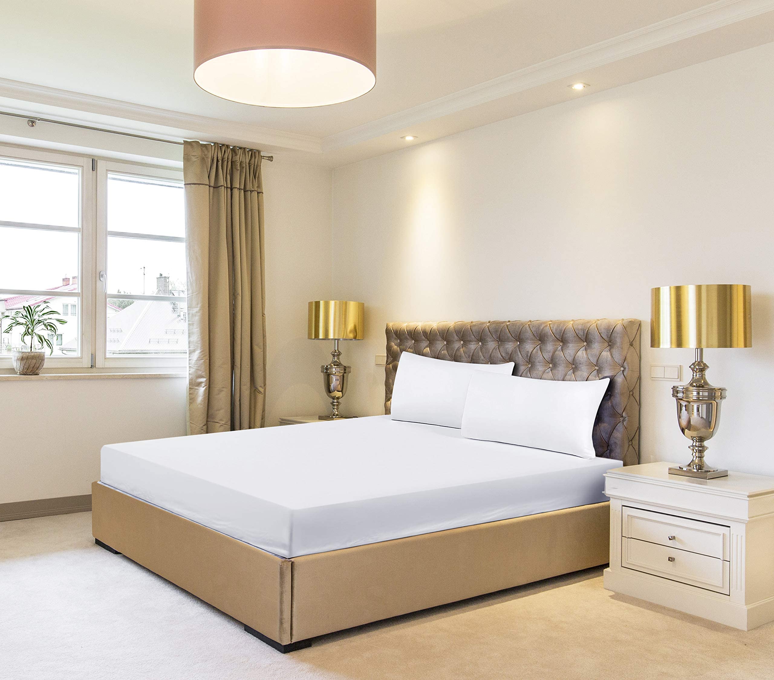 Utopia Bedding queen fitted sheets on a bed illustrate a smooth, inviting sleep surface.