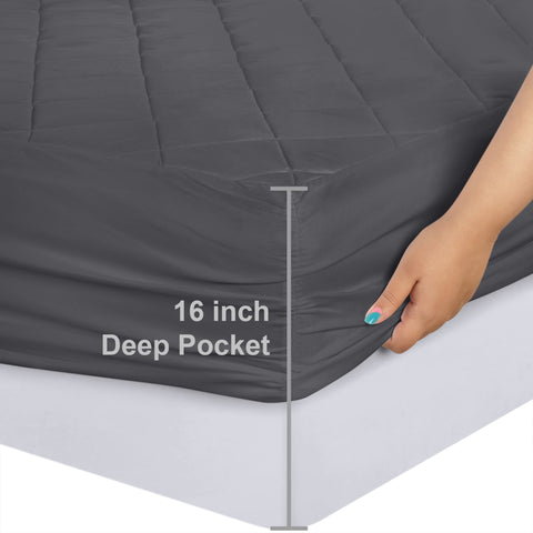 Elastic skirt on Utopia Bedding quilted fitted pad keeps it securely in place.