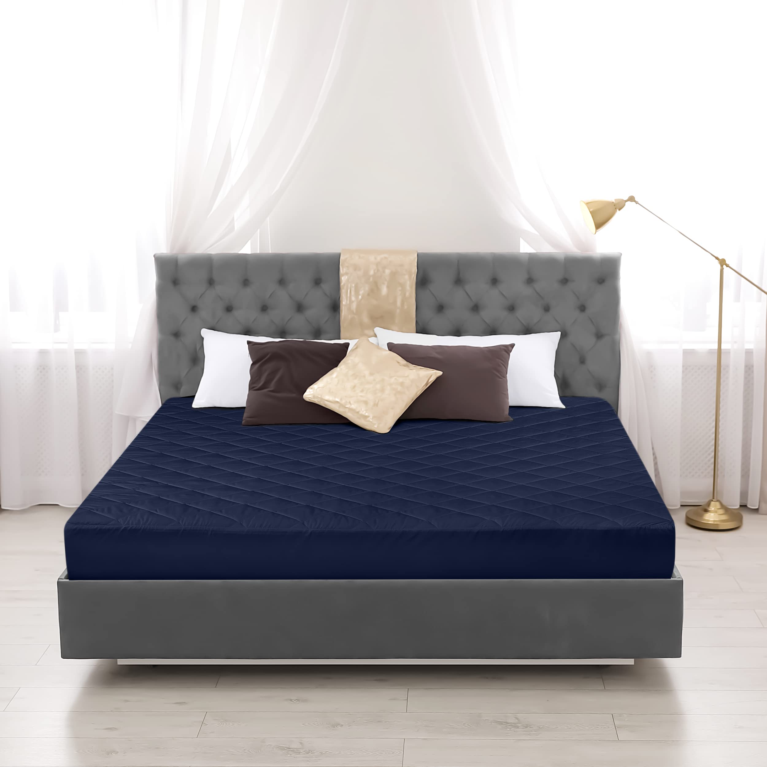 King size navy pad suitable for snug, deep-pocket setups