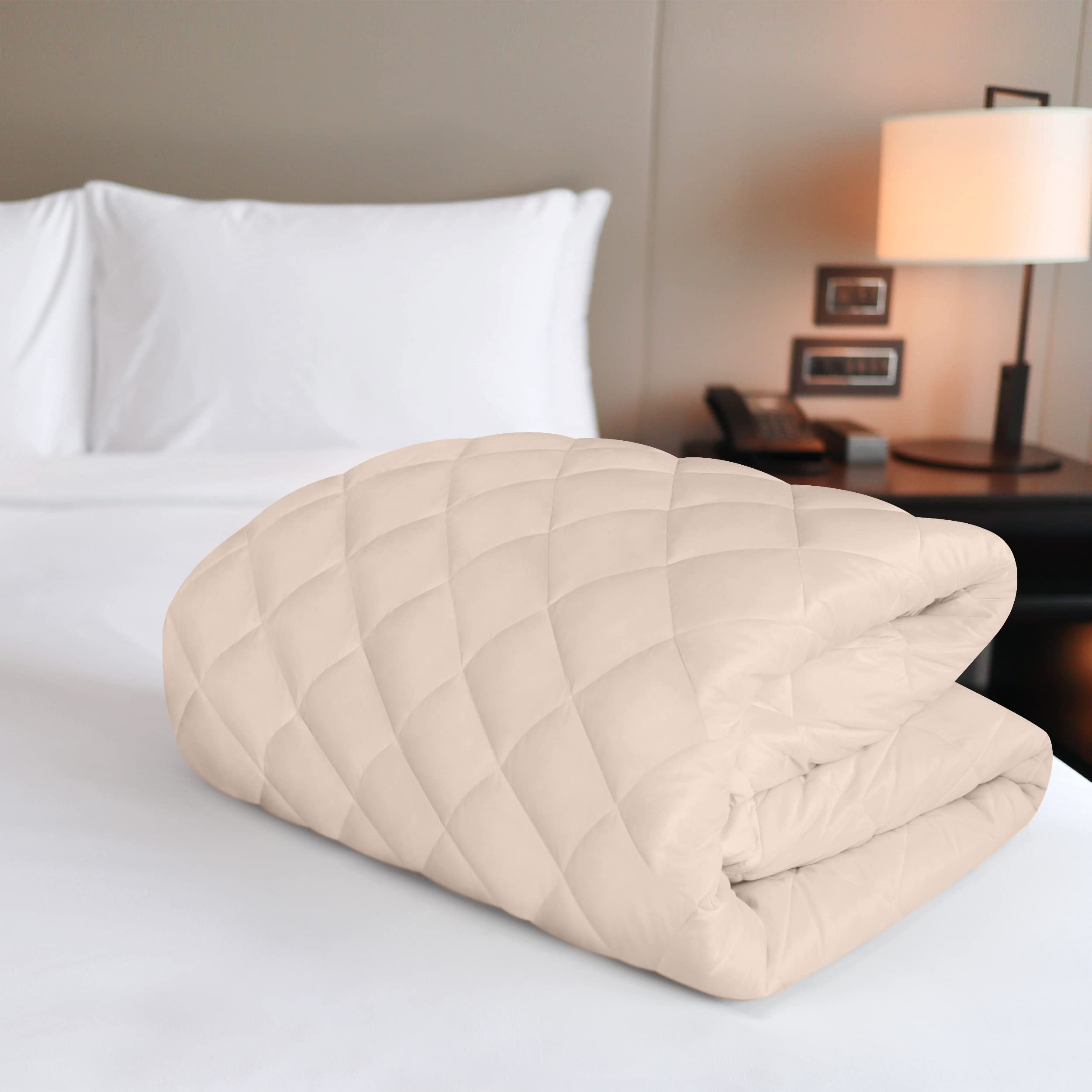 Utopia Bedding machine-washable pad, easy care for busy households.