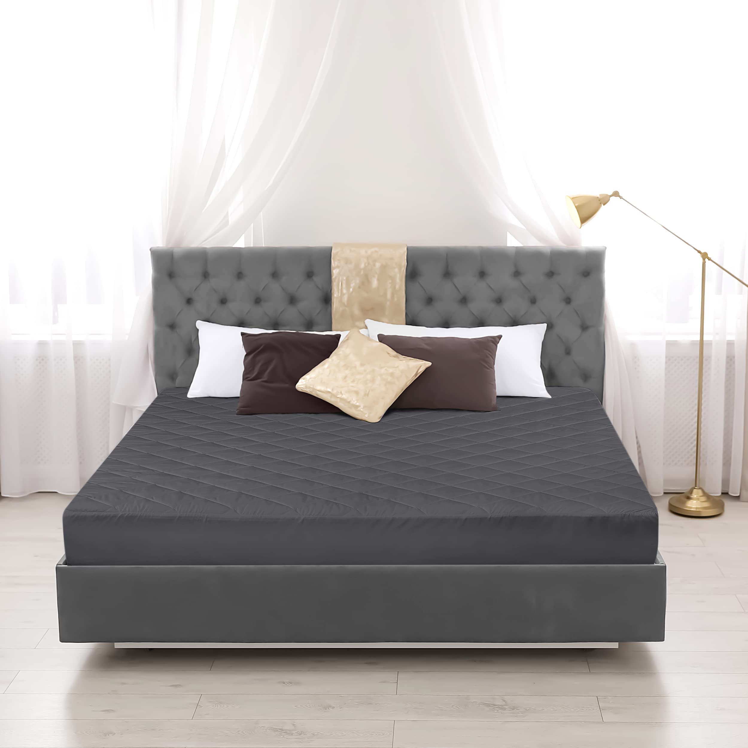 Utopia Bedding quilted topper laid flat showing neat edges on grey fabric.