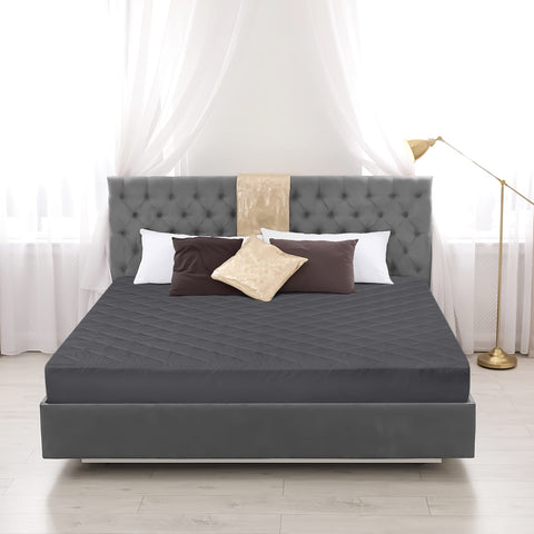 Utopia Bedding quilted topper laid flat showing neat edges on grey fabric.