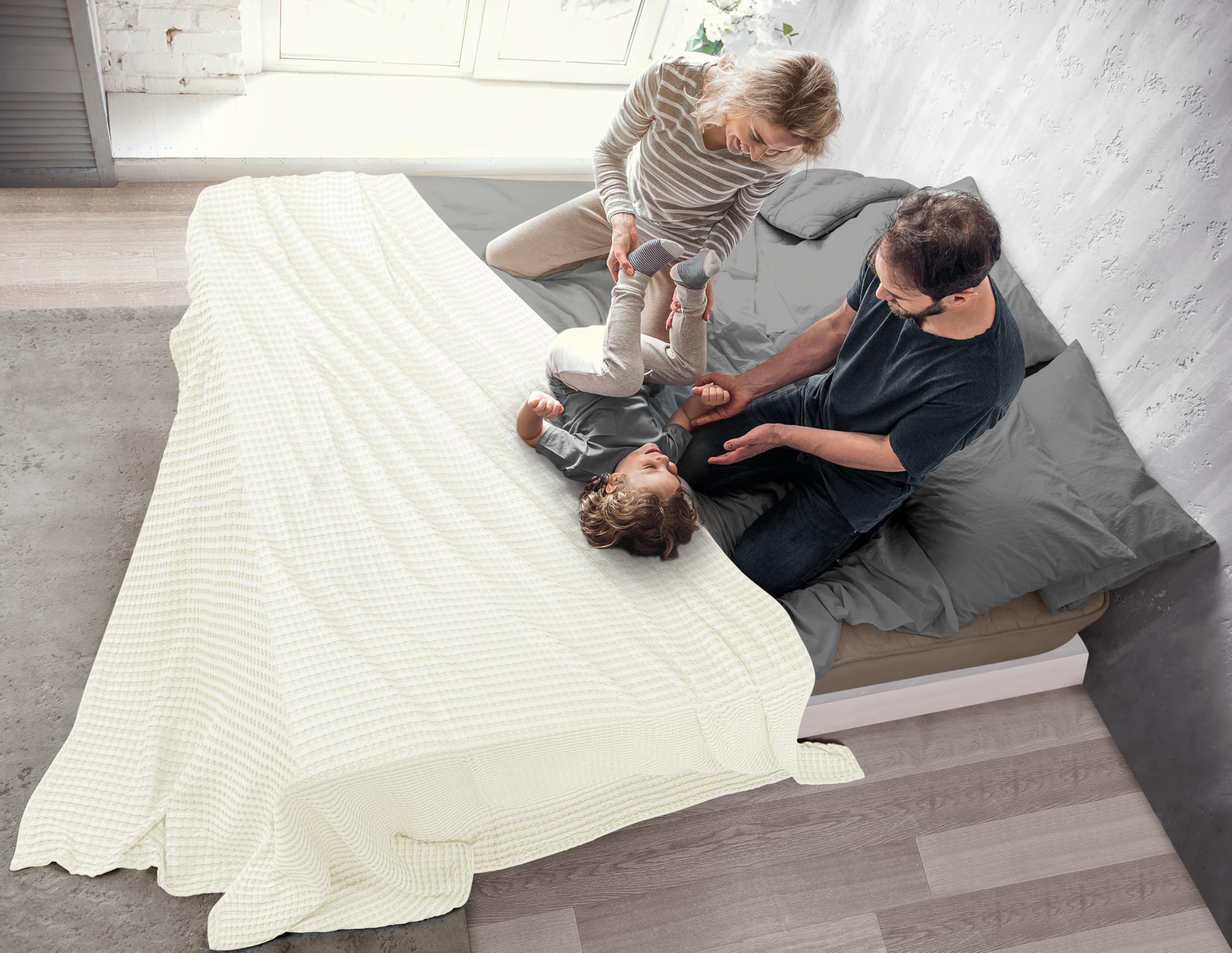 Ring-spun edging detail of Utopia Bedding blanket ensures durability.