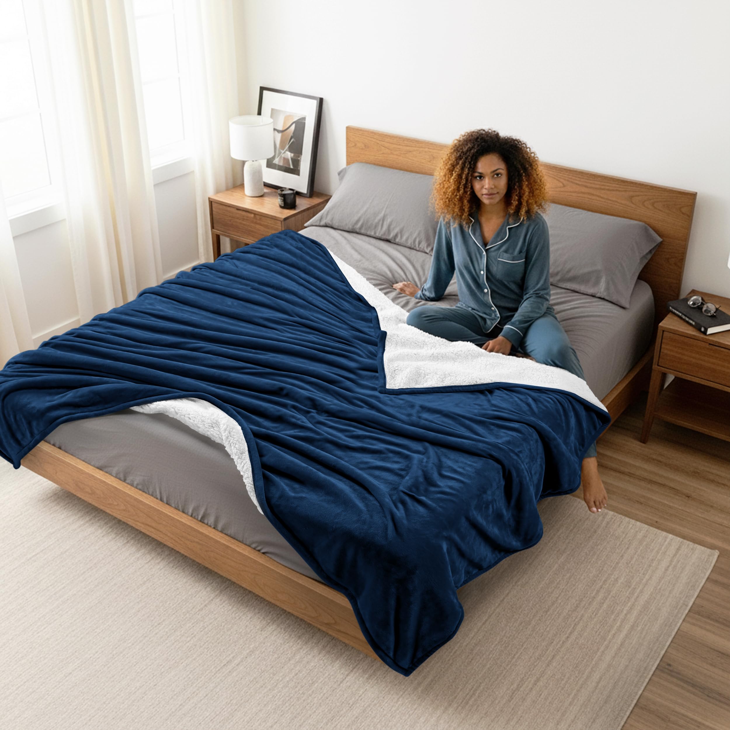 Utopia Bedding Sherpa Blanket during camping stays warm and snuggly