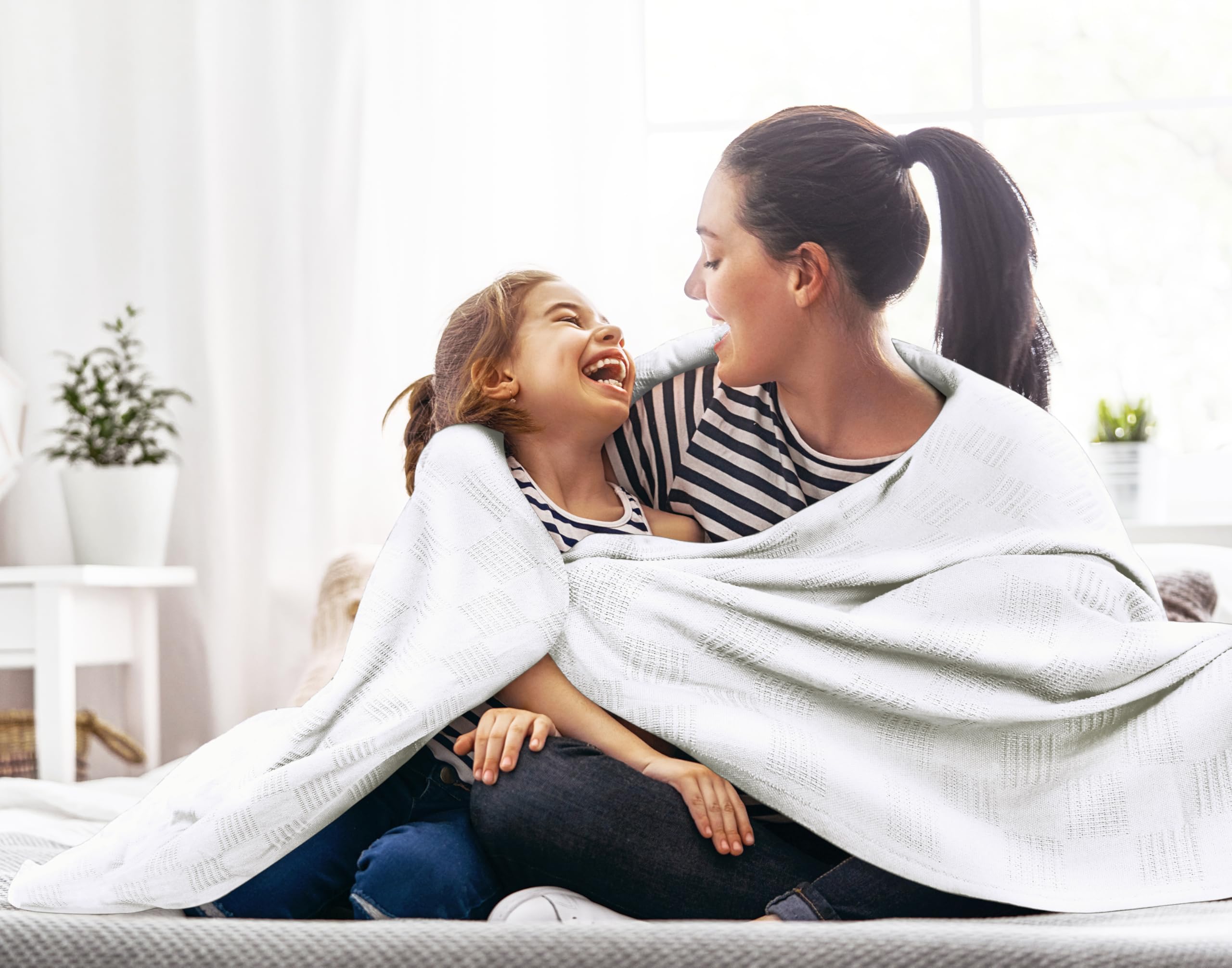 Utopia Bedding soft breathable cotton blanket for year-round temperature regulation.