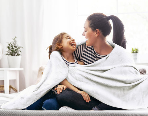 Utopia Bedding soft breathable cotton blanket for year-round temperature regulation.