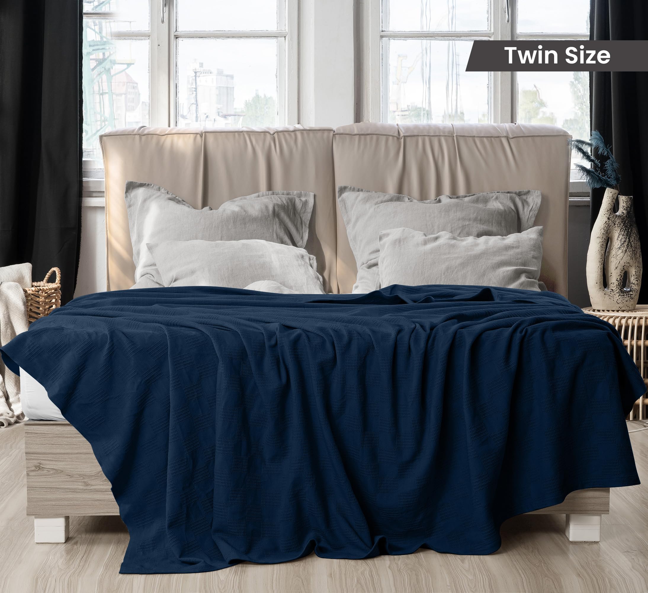 Utopia Bedding navy thermal blanket spread over a sofa for cozy evenings.