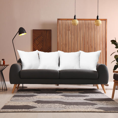 Utopia Bedding four-pack set displayed in living room, cohesive decor and comfortable inserts.