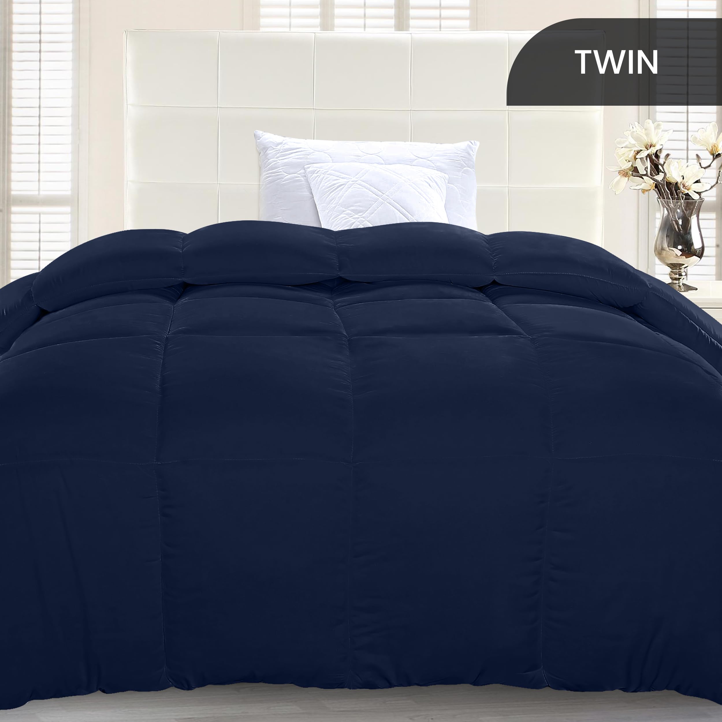 Utopia Bedding box-stitched navy duvet insert shows even loft and durable edges.