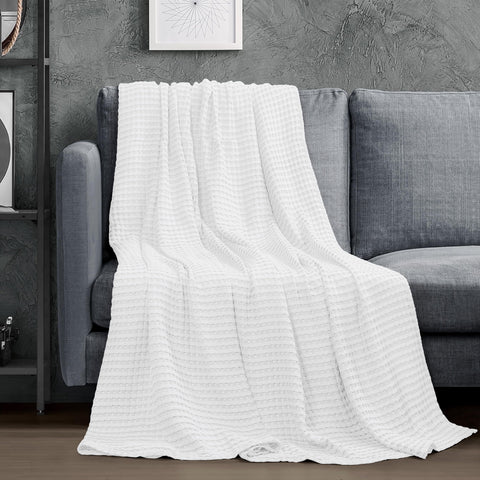 Utopia Bedding waffle blanket draped over bed for breathable comfort