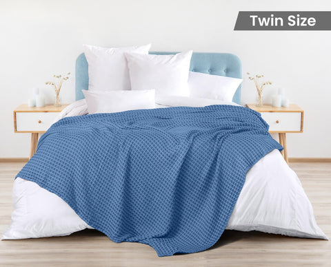 Utopia Bedding twin waffle blanket folded for compact storage and quick access.