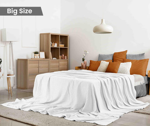 Utopia Bedding blanket draped on bed highlighting lightweight comfort and size