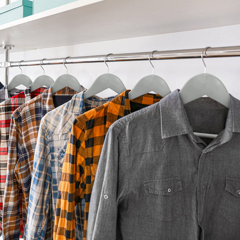 Utopia Home shoulder-groove wooden hangers maintain garment shape and reduce shoulder marks.