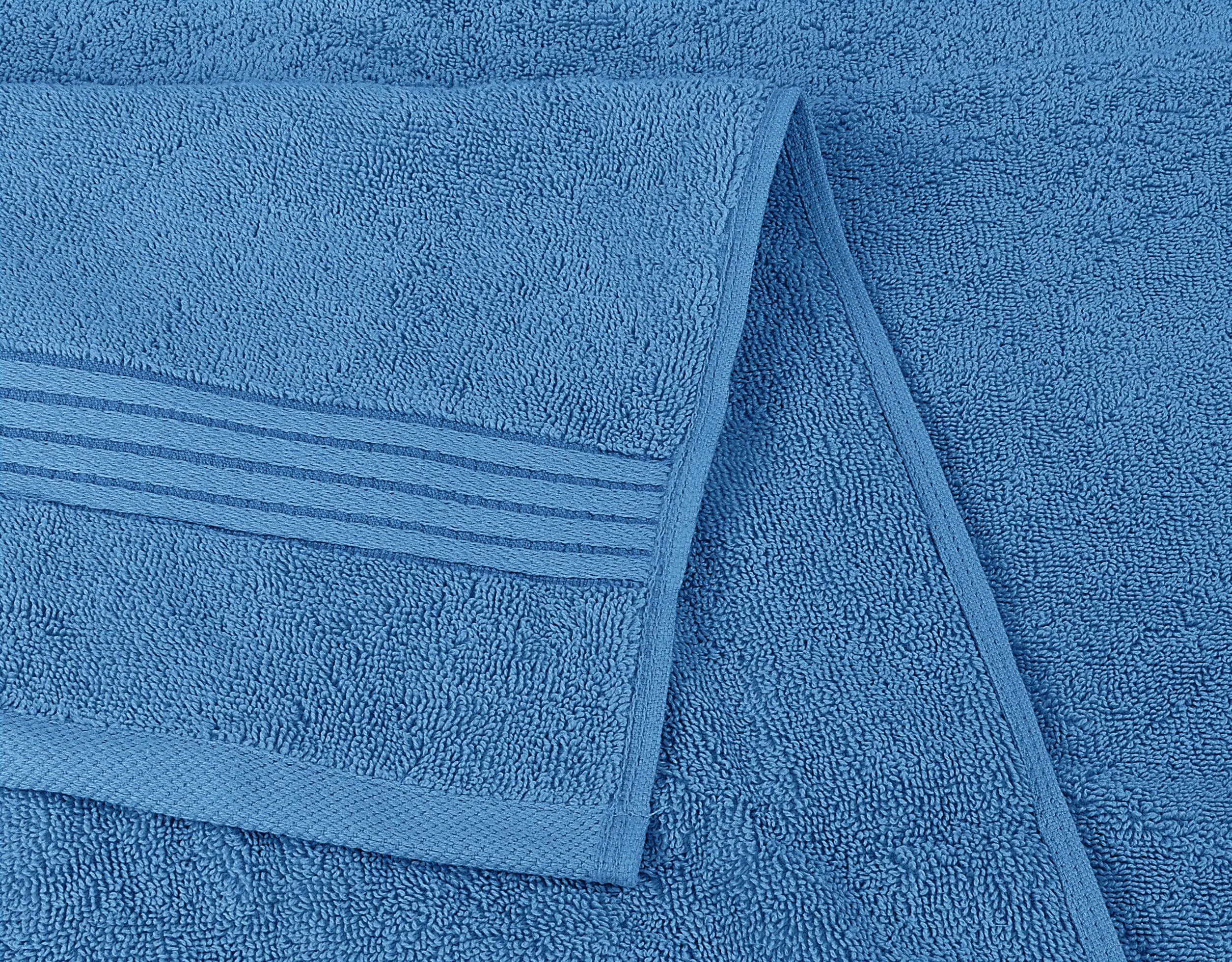 Utopia Towels bathroom scene in electric blue for vibrant bath decor